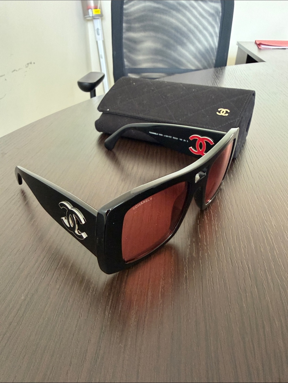 CHANEL Black Frame Sunglasses with Brown Lenses